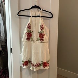 White romper with flower appliqués size S
